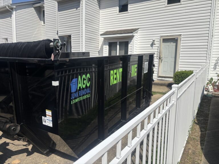 15 yard dumpster beside townhouse in Virginia Beach