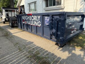Neighborly Hauling 17-yard dumpster in driveway placement, Grand Rapids MI