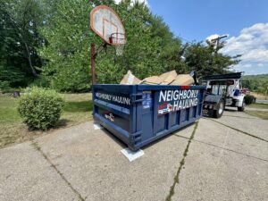 12 yard dumpster loaded with boxes during a residential cleanout in Kent County